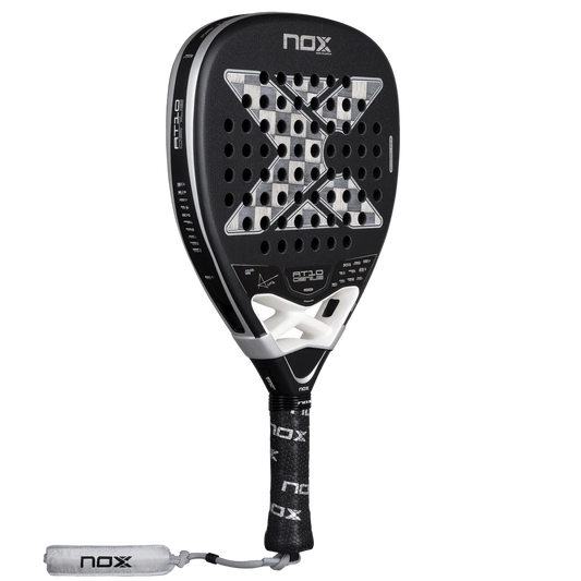 Side view of the black and white Nox AT10 Luxury Genius Attack 18K padel racket with curved frame.