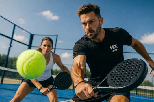 two beginner padel players hitting a padel ball during a rally on court, designed for beginner players