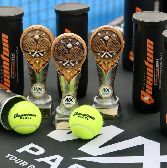 quantum padel balls with trophies at wx padel tournament on court, designed for all level players