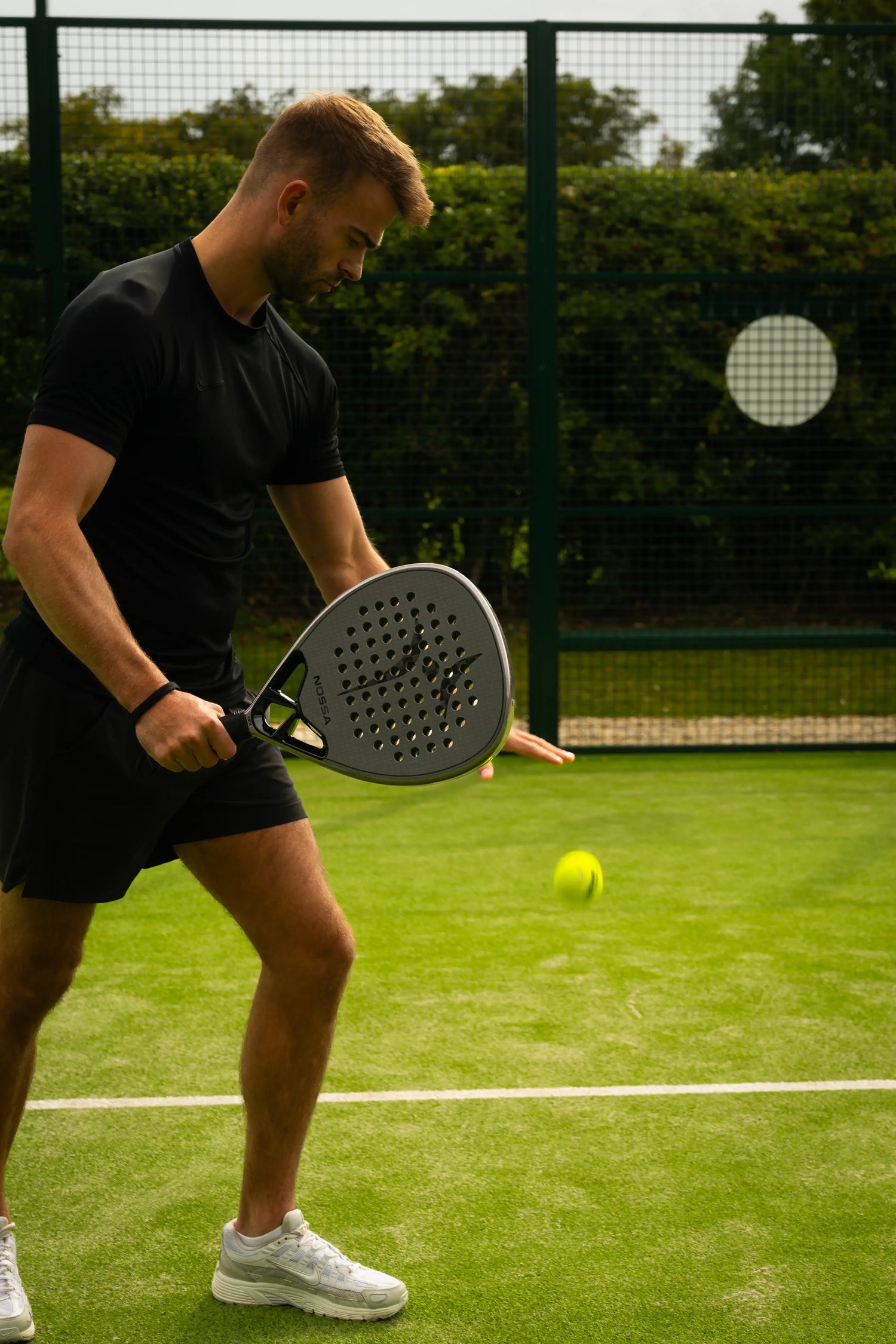 Nossa Padel court lifestyle. Showing the nossa core racket in action