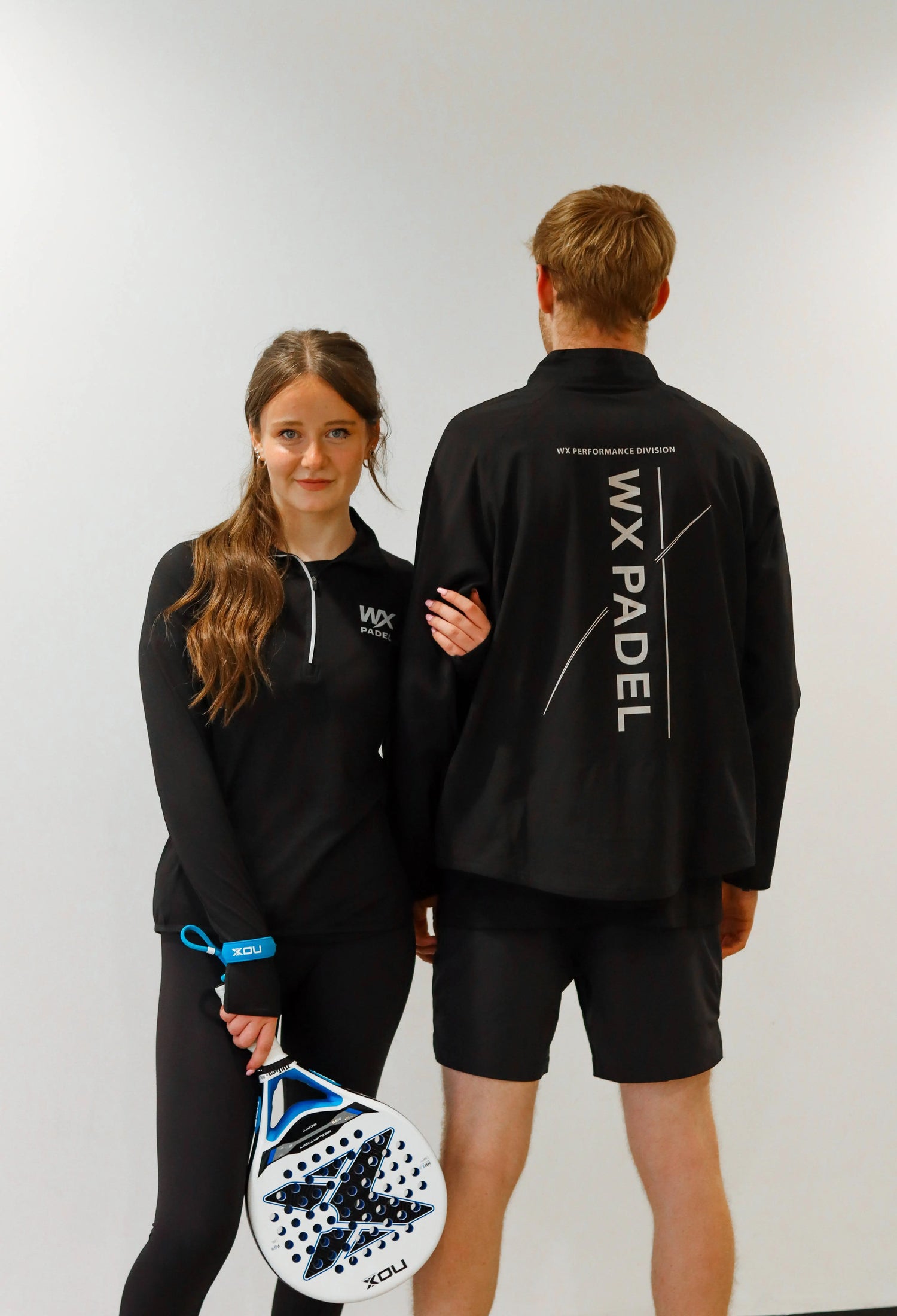WX Padel black performance clothing for men and women with Performance Division back print