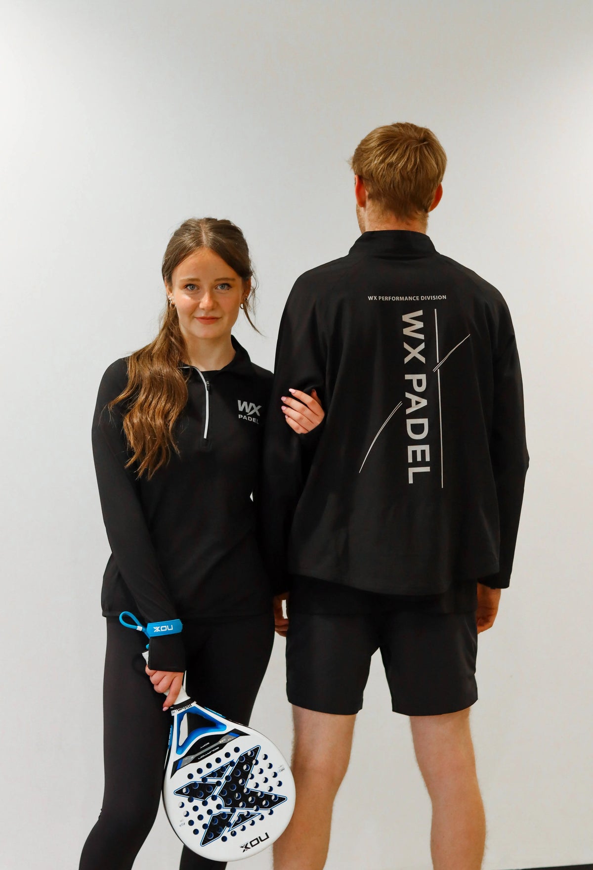 WX Padel black performance clothing for men and women with Performance Division back print
