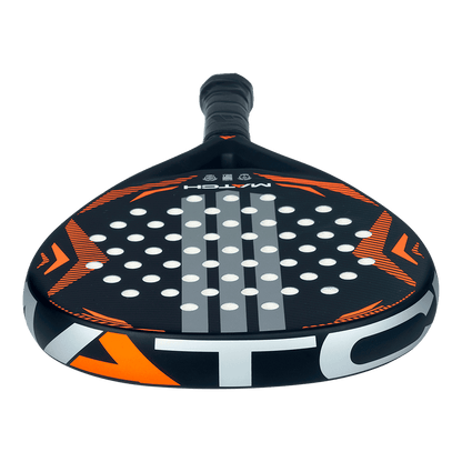 Underside view of Adidas Match 2026 padel racket in black and orange highlighting hole pattern, designed for beginner players