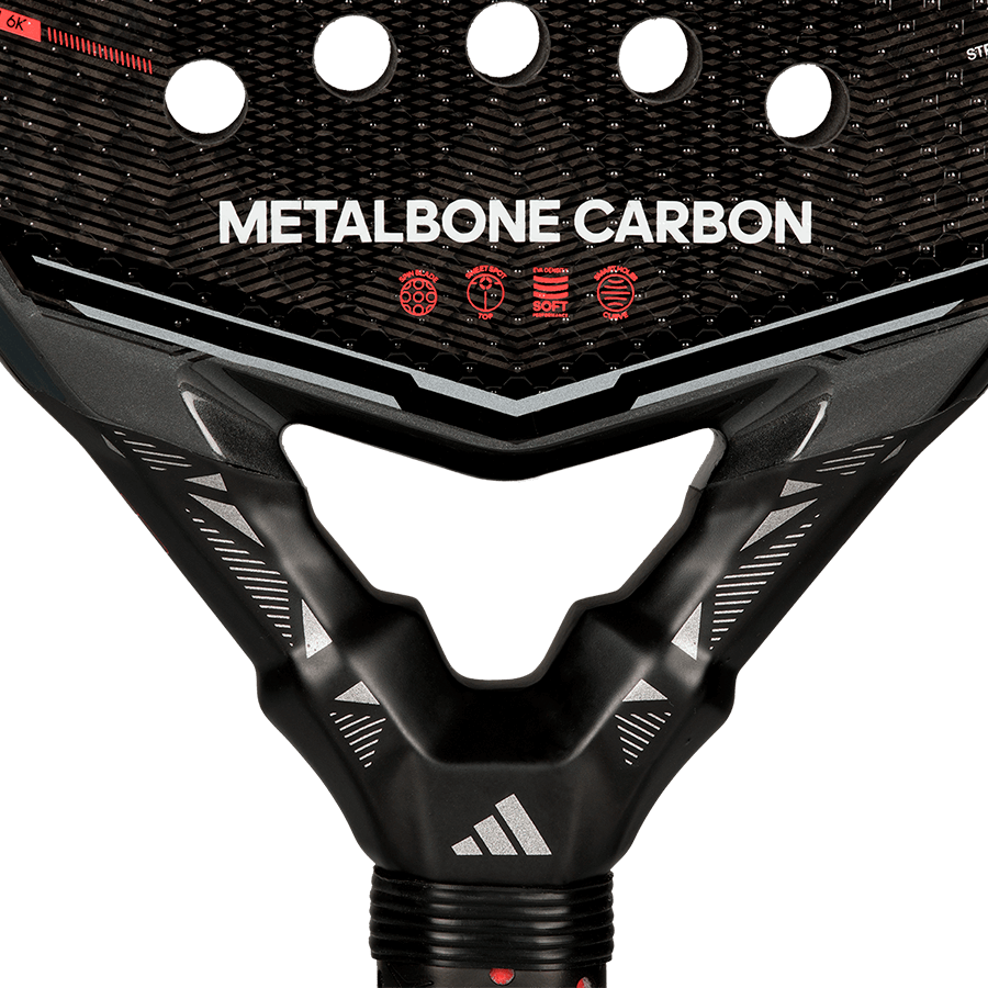Detail view of the Adidas Metalbone Carbon 2026 neck showing structural frame and carbon texture, designed for advanced players.