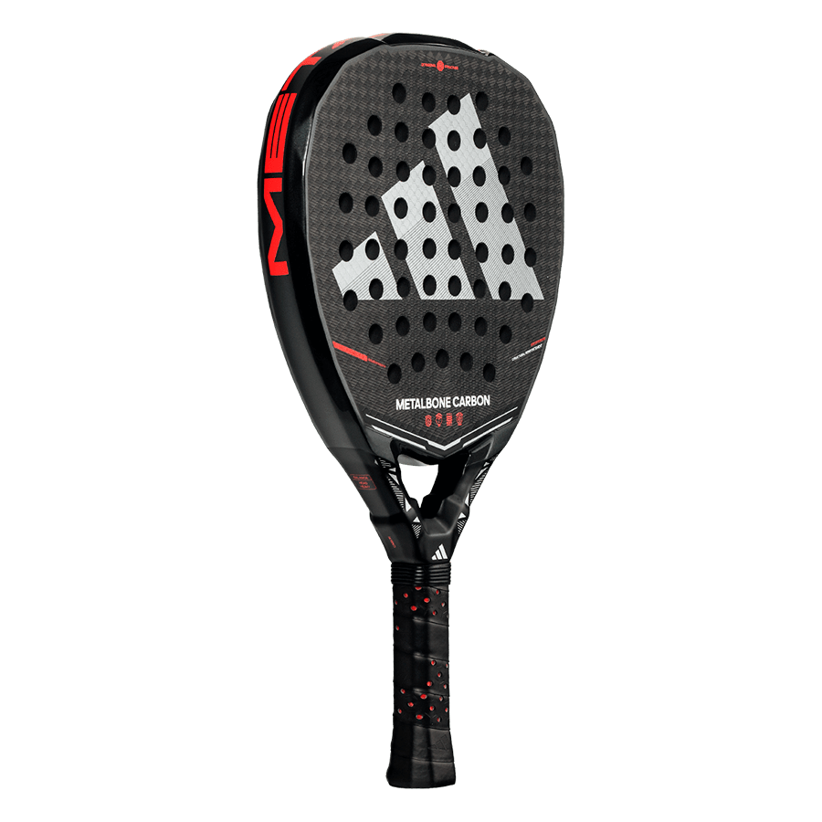 Angled view of the Adidas Metalbone Carbon 2026 padel racket showing carbon 6K face and red details, designed for advanced players.