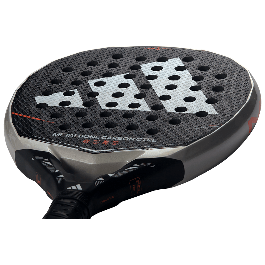 Angled view of the Adidas Metalbone Carbon CTRL 2026 racket with carbon 6K face and Adidas logo detailing, designed for advanced players.