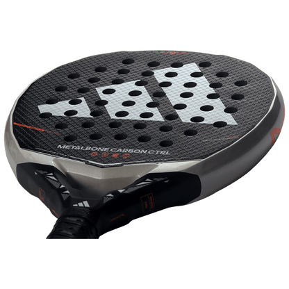 Angled view of the Adidas Metalbone Carbon CTRL 2026 racket with carbon 6K face and Adidas logo detailing, designed for advanced players.
