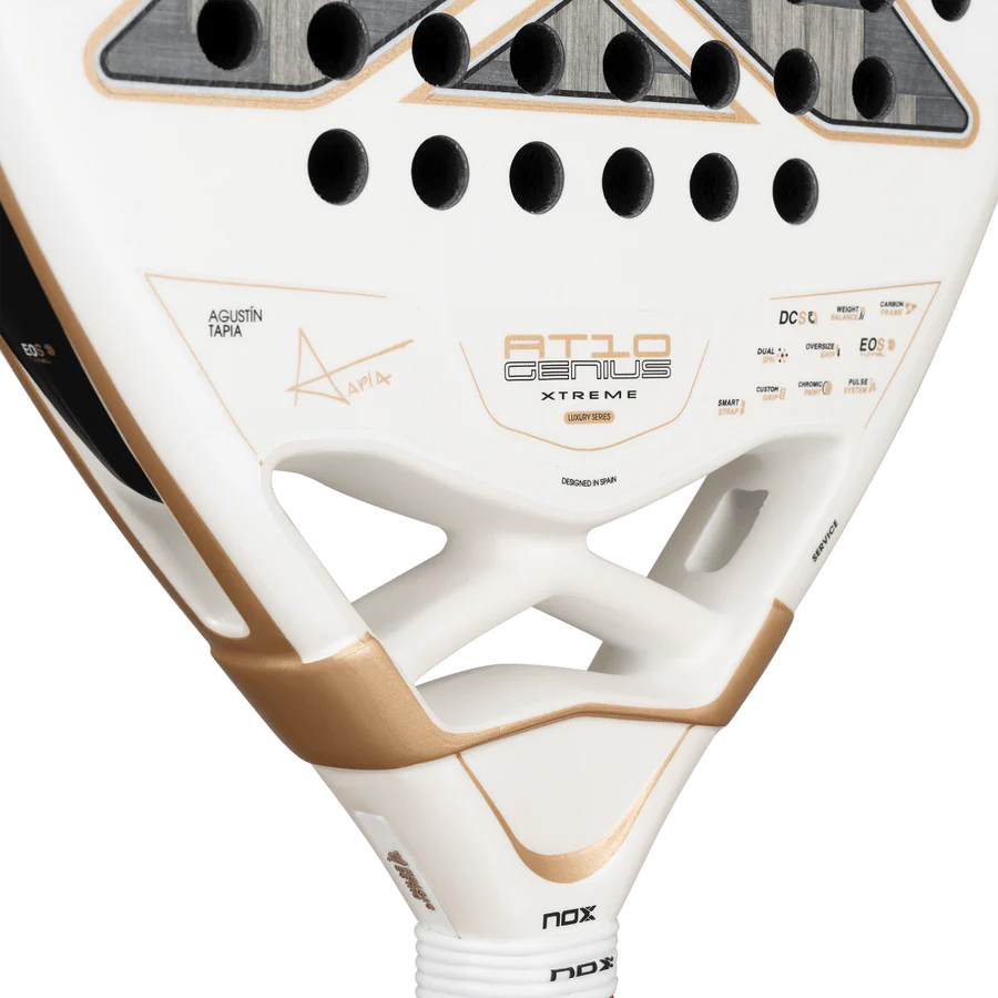 NOX AT10 Luxury Genius 12K Alum XTREM 2026 padel racket close-up of bridge and branding, white and gold design, designed for advanced players.