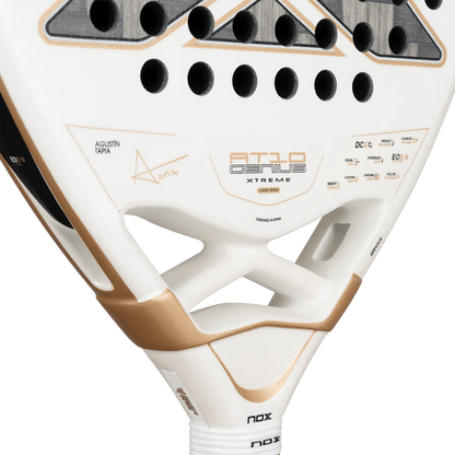NOX AT10 Luxury Genius 12K Alum XTREM 2026 padel racket close-up of bridge and branding, white and gold design, designed for advanced players.