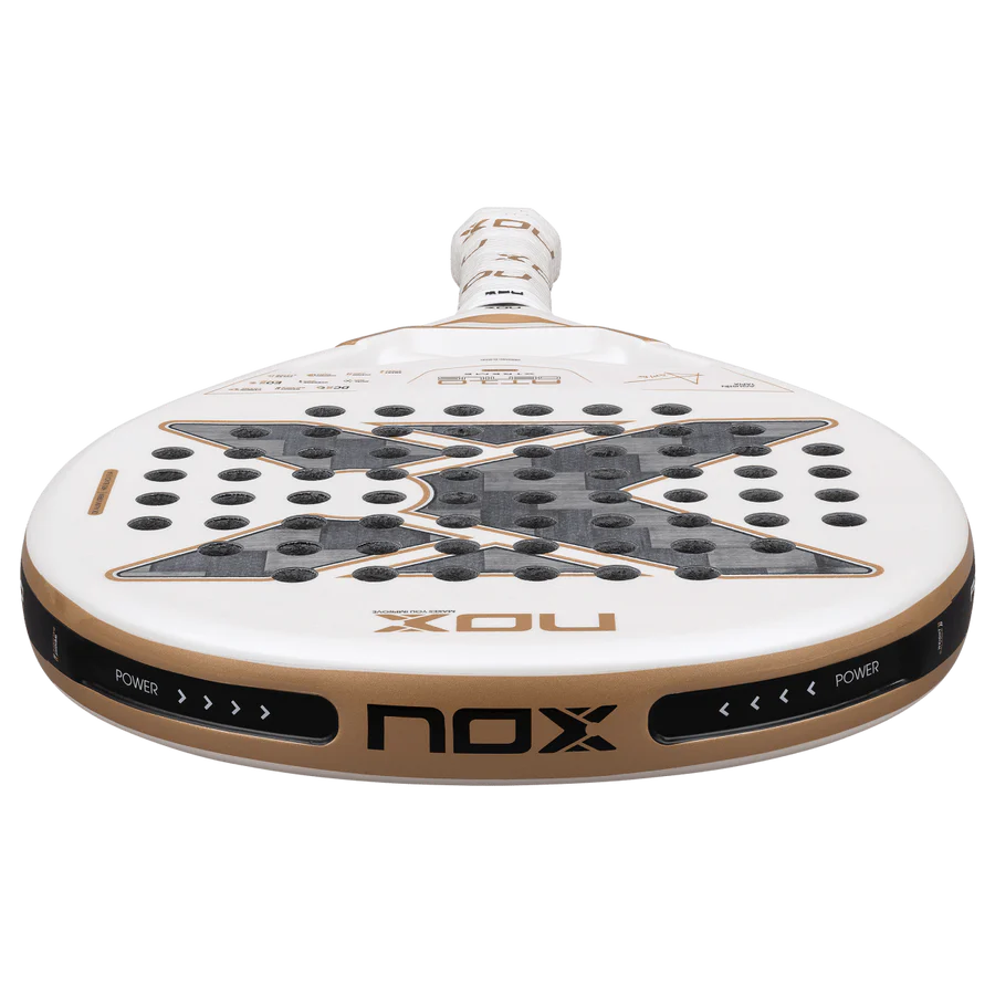 NOX AT10 Luxury Genius 12K Alum XTREM 2026 padel racket close-up of lower frame and brand detailing, white and gold design, designed for advanced players.