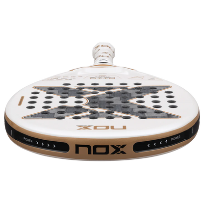 NOX AT10 Luxury Genius 12K Alum XTREM 2026 padel racket close-up of lower frame and brand detailing, white and gold design, designed for advanced players.