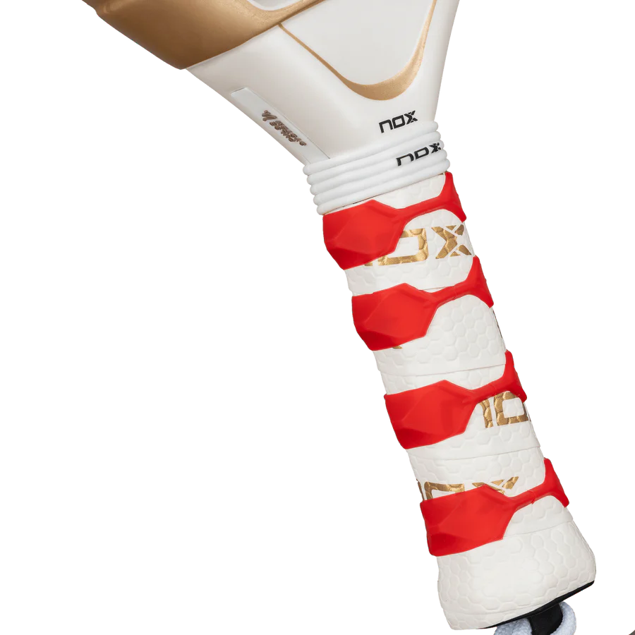 NOX AT10 Luxury Genius 12K Alum XTREM 2026 padel racket overgrip close-up with red tape and gold branding, designed for advanced players.