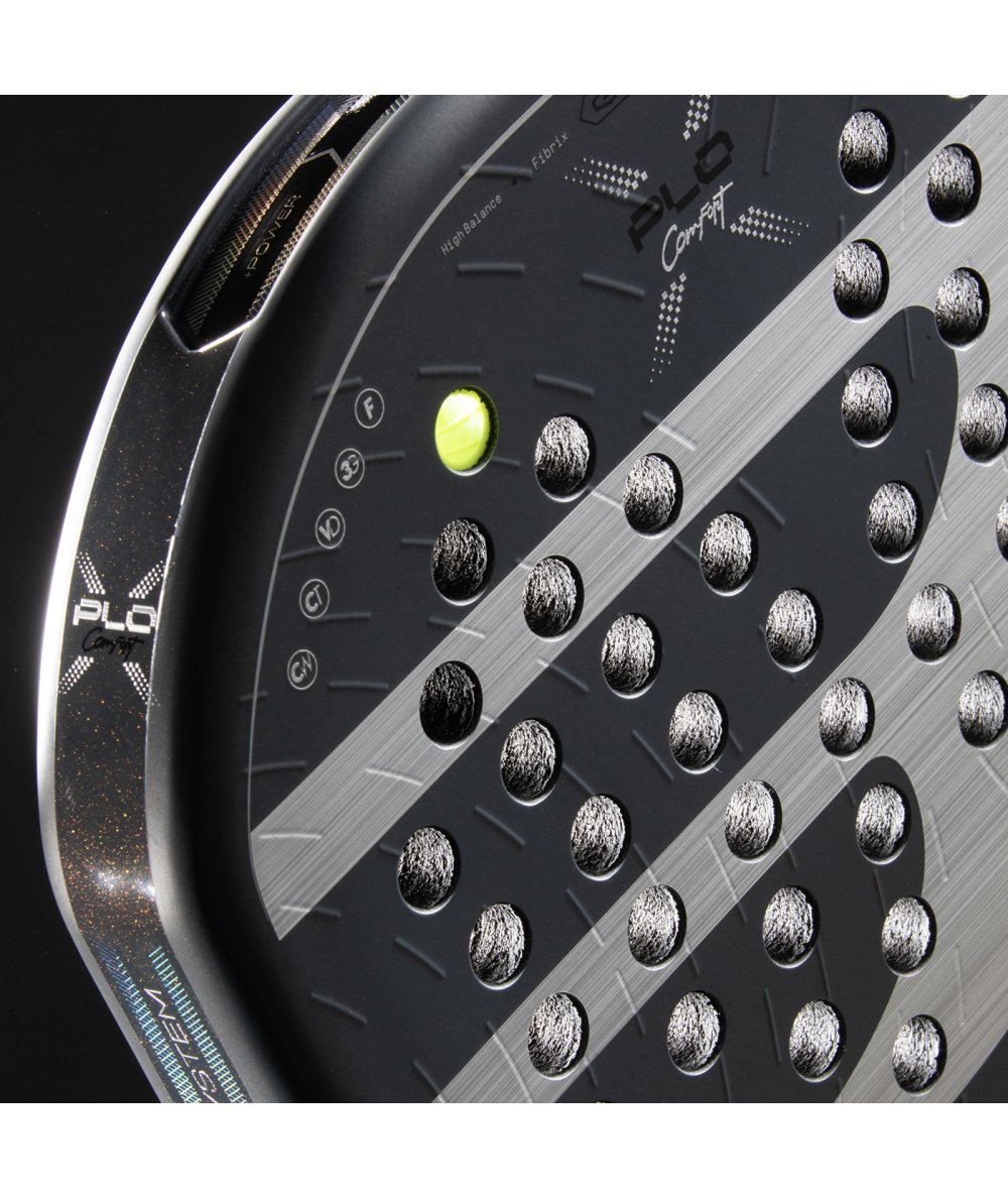 Bullpadel Xplo Comfort 26 padel racket, grey and white face with drilled holes and neon highlights, close-up angle.