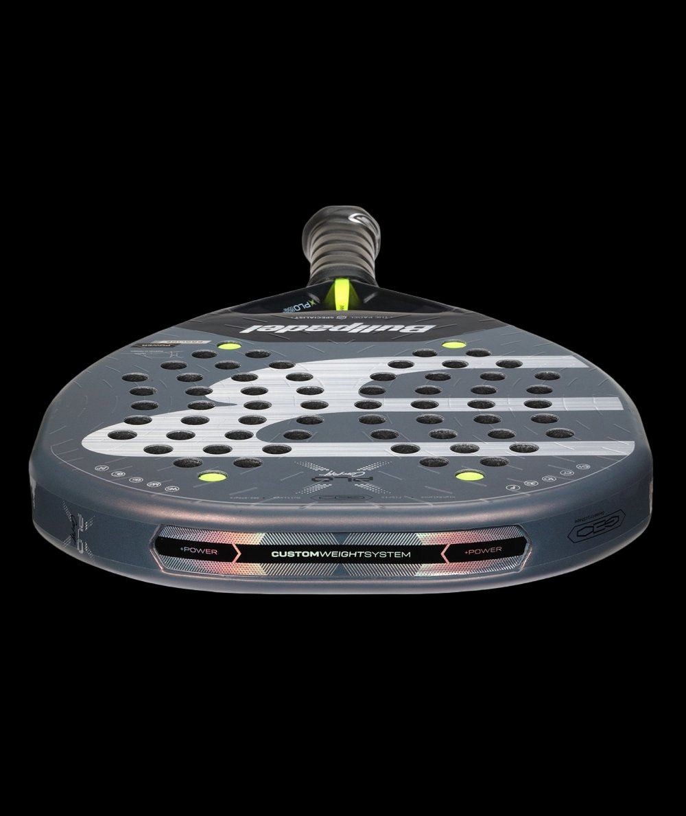 Bullpadel Xplo Comfort 26 padel tennis racket for advanced players, black and grey design with white B logo, low angle view.