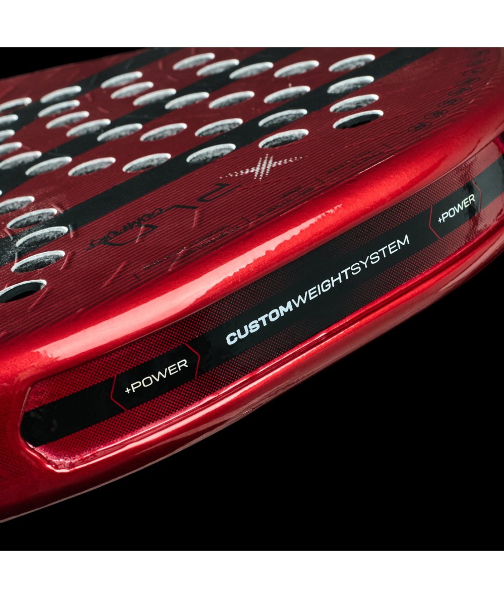 bullpadel xplo comfort 25 padel racket low angle view highlighting the hitting surface and custom weight inserts.