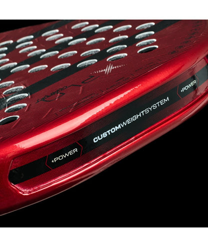bullpadel xplo comfort 25 padel racket low angle view highlighting the hitting surface and custom weight inserts.