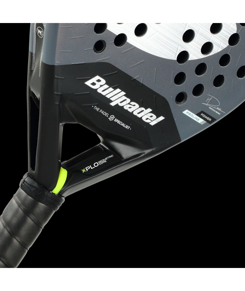 Bullpadel Xplo Comfort 26 padel racket, black and grey design with neon detail, close-up handle section for advanced players.