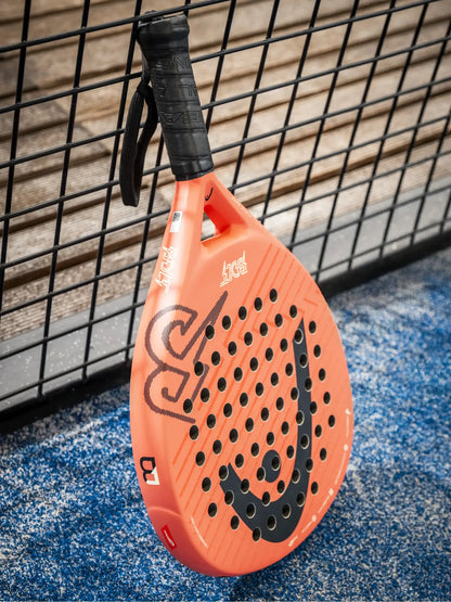 HEAD Bolt 2026 padel racket angled on blue court surface near fence, designed for beginner players