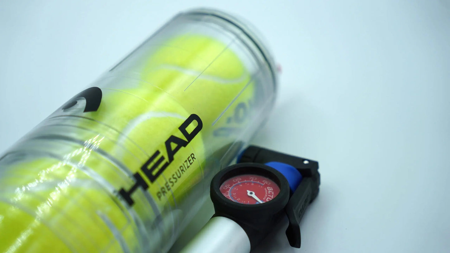 HEAD X4 ball pressuriser with pump and pressure gauge beside transparent tube holding padel balls