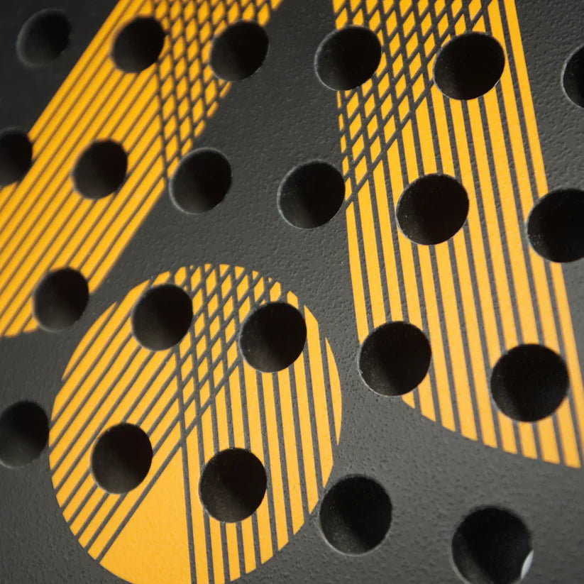 karakal air lite 345 padel racket orange, textured hitting surface and perforations close up, designed for beginner players