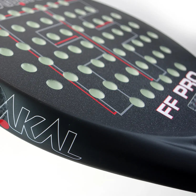 Side profile of FF PRO racket showing granular finish and precise hole layout for control, designed for advanced players