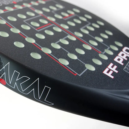 Side profile of FF PRO racket showing granular finish and precise hole layout for control, designed for advanced players
