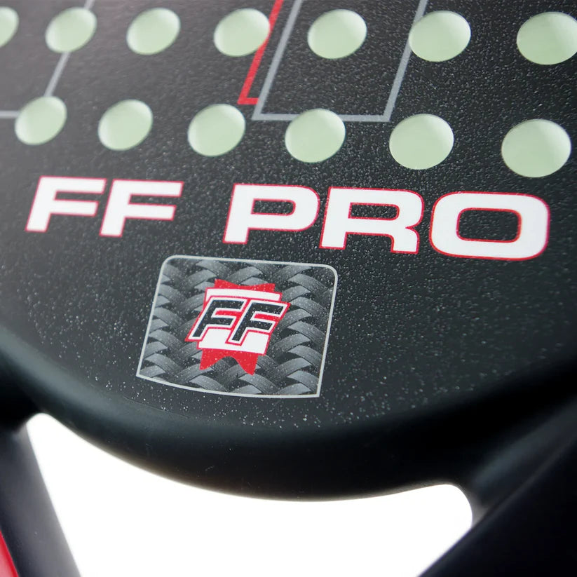 Close-up of FF PRO logo and carbon surface texture on racket face, designed for advanced players