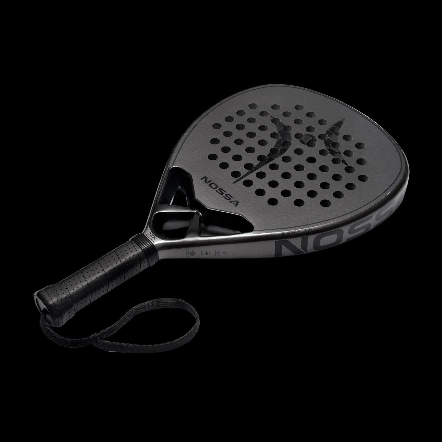 Nossa padel racket angled view in dark grey showing carbon face detailing modern shape and control focused design