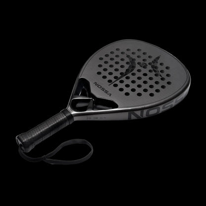 Nossa padel racket angled view in dark grey showing carbon face detailing modern shape and control focused design