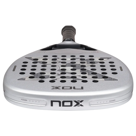 Low-angle view of the NOX AT10 Genius Attack 12K Alum XTREM 2027 showing the silver racket face, frame and power markings