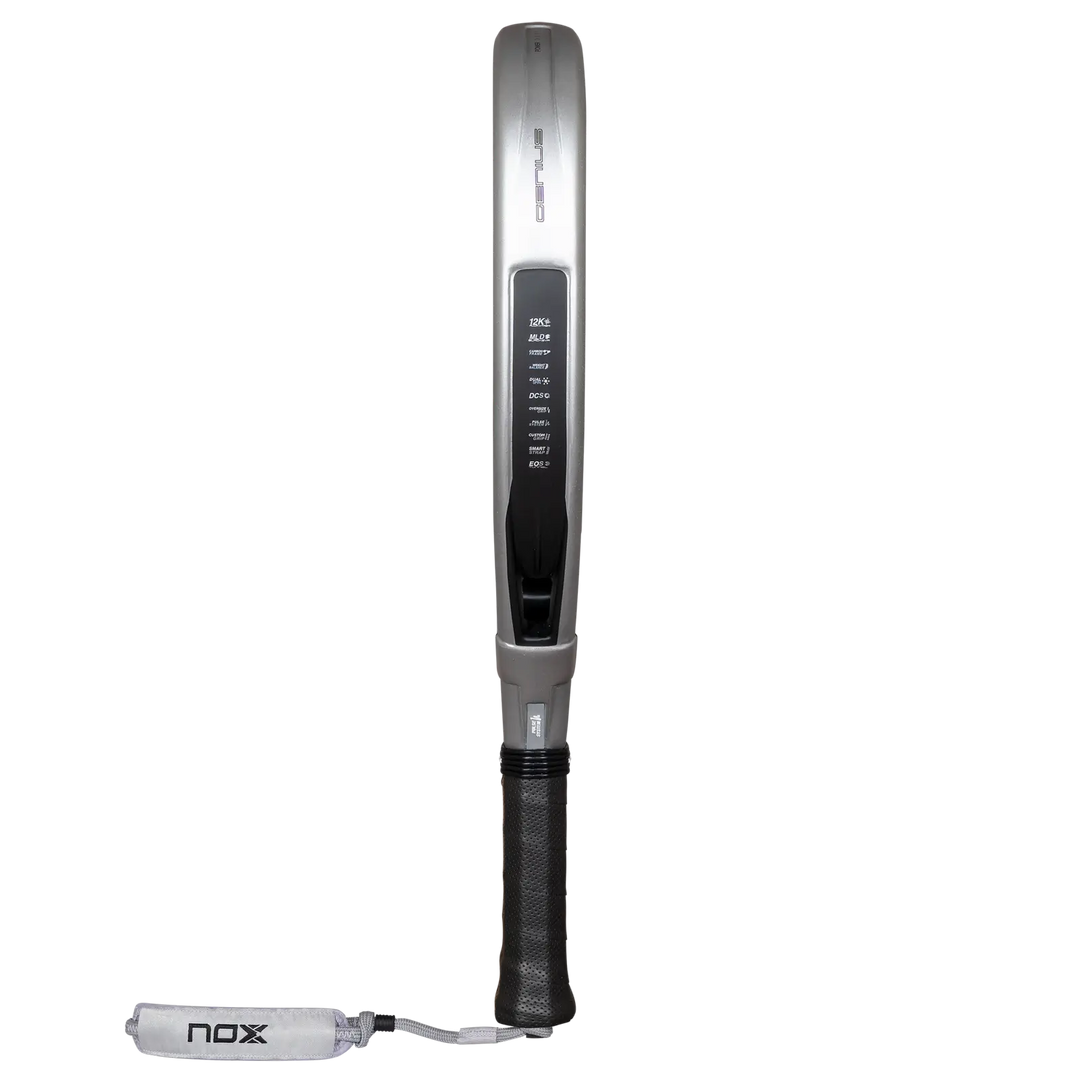 Side profile of the NOX AT10 Genius Attack 12K Alum XTREM 2027 showing the silver frame, racket thickness and black grip