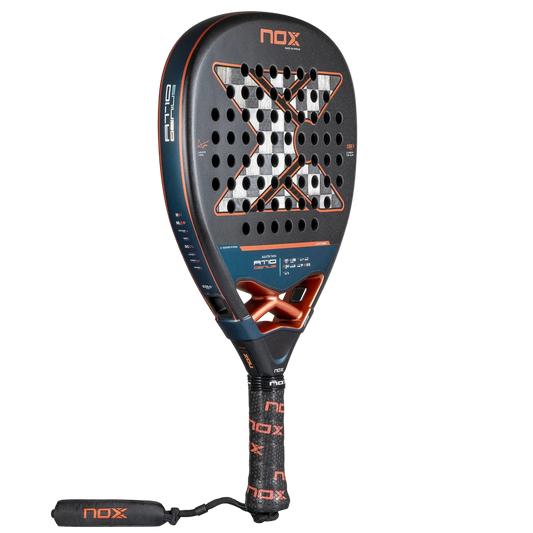Nox AT10 Genius Attack 18K Alum padel tennis racket by Agustín Tapia – black and copper X design shown in angled side view on transparent background.`