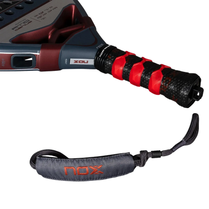 Nox AT10 Luxury Genius 12K 2025 padel racket wrist strap close up with NOX branding, designed for advanced players
