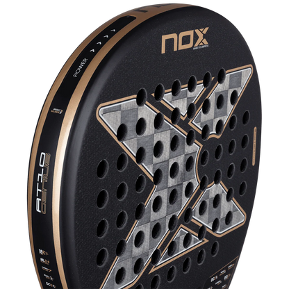 Nox AT10 Luxury Genius 18K Alum 2026 padel racket face close up showing carbon surface and hole pattern, designed for advanced players