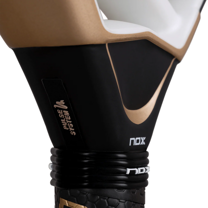 Nox AT10 Luxury Genius 18K Alum 2026 padel racket handle base close up showing pulse system and grip connection, designed for advanced players
