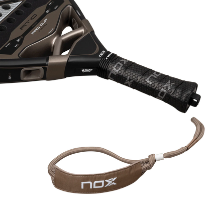 Nox AT10 Pro Cup Hard 2026 handle and wrist strap detail padel racket