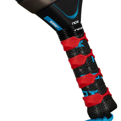 Nox AT10 Pro Cup Soft 2026 padel racket grip close up with red overgrip and textured handle, designed for advanced players