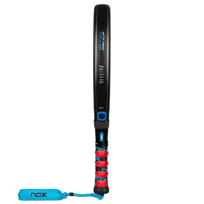 Nox AT10 Pro Cup Soft 2026 padel racket side profile showing frame thickness with red overgrip and wrist strap, designed for advanced players