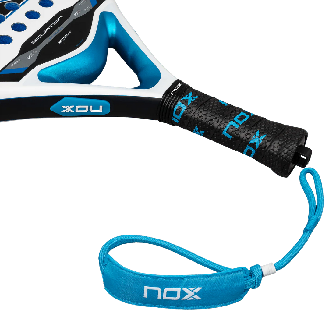 Nox Equation Soft Advanced 2026 padel racket grip close up with wrist strap and handle detail, designed for intermediate players
