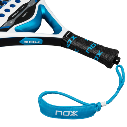 Nox Equation Soft Advanced 2026 padel racket grip close up with wrist strap and handle detail, designed for intermediate players