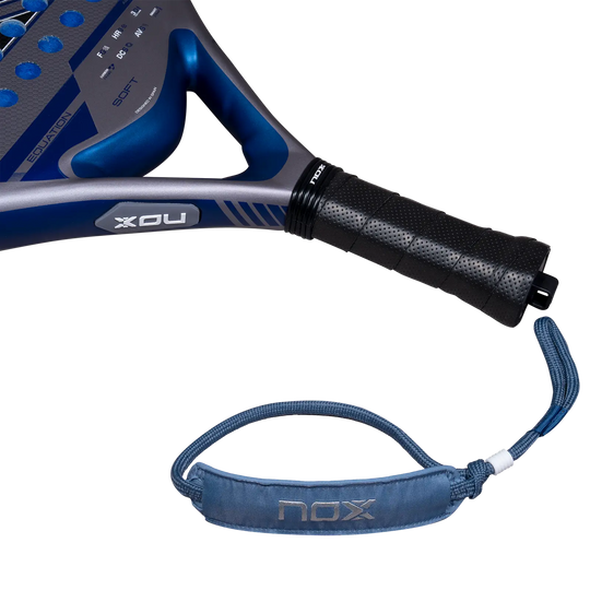 Nox Equation Soft Advanced 2027 padel racket handle with black perforated grip, blue wrist strap and blue throat