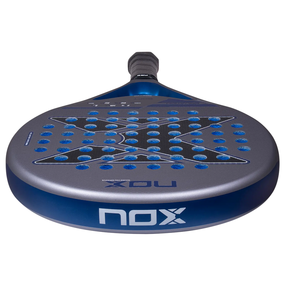 Nox Equation Soft Advanced 2027 padel racket viewed from a low angle showing textured face and blue frame edge