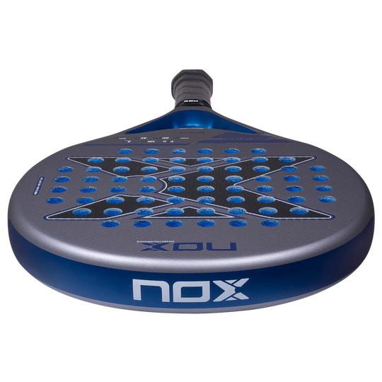 Nox Equation Soft Advanced 2027 padel racket viewed from a low angle showing textured face and blue frame edge
