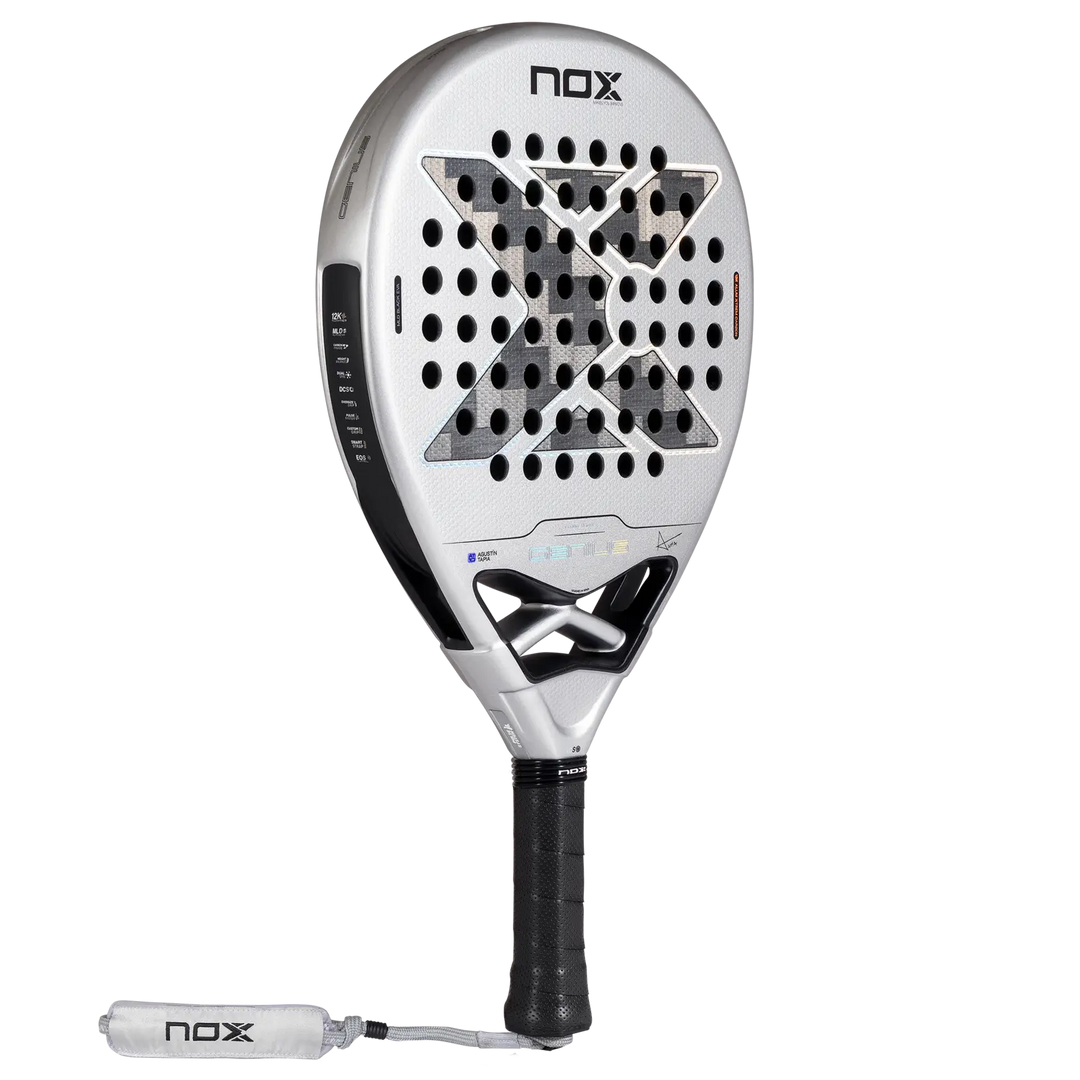 Angled front view of the NOX Genius 12K Alum XTREM 2027 padel racket showing its silver face, black frame and grip