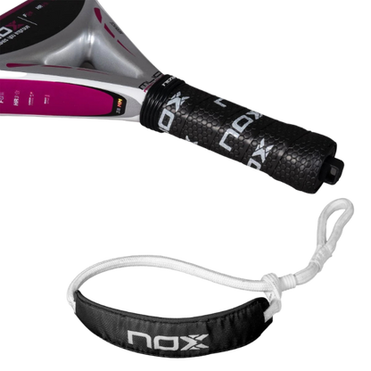 Close-up handle view of the Nox ML10 Pro Cup Silver padel racket showing strap.