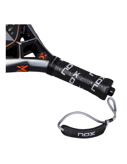 Close-up of the Nox Nextgen Pro Hybrid 3K NFA Series padel racket handle in black with white branding and wrist strap, designed for intermediate players.