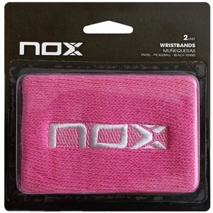 Nox pink padel wristbands front view in retail packaging with embroidered logo, designed for all level padel and pickleball players.