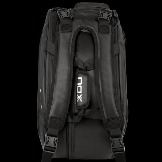 Nox Pro Series black padel racket bag backpack view showing padded straps and carry system, designed for all level players