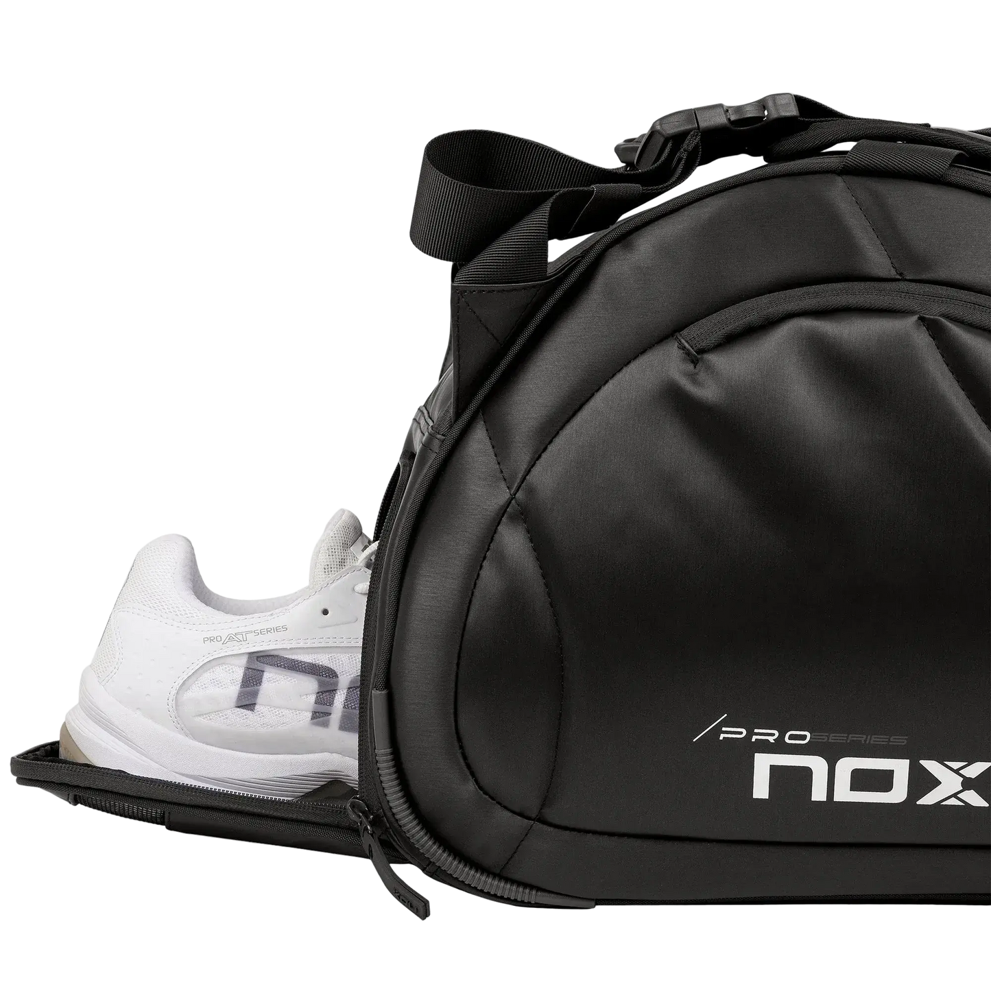 Nox Pro Series black padel racket bag showing ventilated shoe compartment with trainers, designed for all level players