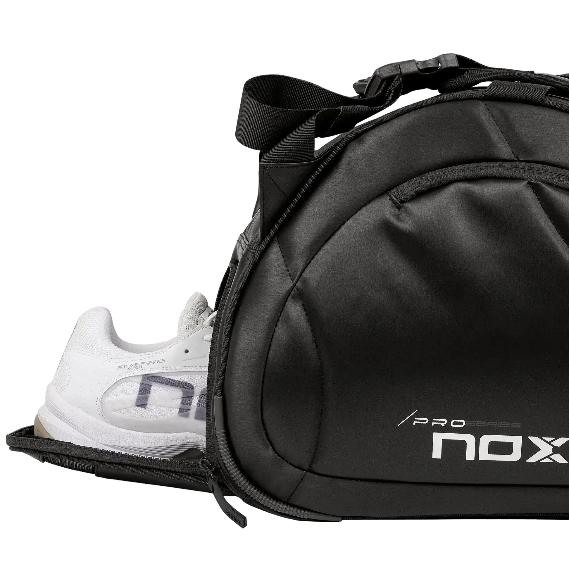 Nox Pro Series black padel racket bag showing ventilated shoe compartment with trainers, designed for all level players